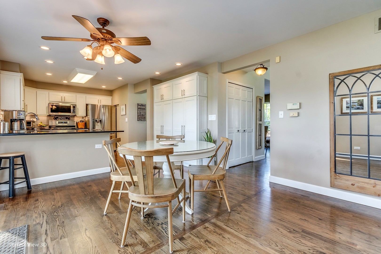 705 Churchill Lane Oswego, IL 60543 - Photo 9 of 34 a view of a dining room with furniture and wooden floor