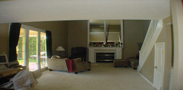 6879 Sentinel Road Rockford, IL 61107 - Photo 4 of 4 a living room with furniture and a fireplace