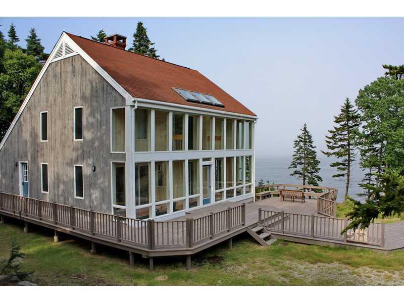 256 Red Point Road Swans Island, ME 04685 - Photo 5 of 32 Exterior Front. The main house has...