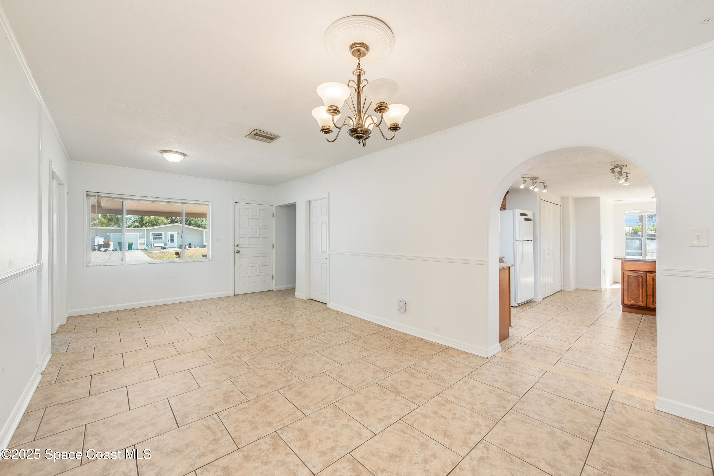 2021 Nottingham Road Melbourne, FL 32935 - Photo 3 of 28 Updated Tile Floors Throughout!
