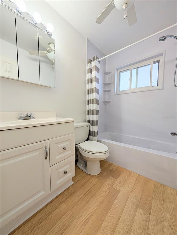 1540 Pleasant Road, Unit G35 Bradenton, FL 34207 - Photo 13 of 23 a bathroom with a sink a toilet and shower