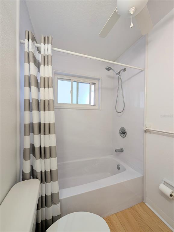 1540 Pleasant Road, Unit G35 Bradenton, FL 34207 - Photo 14 of 23 a bathroom with a bathtub toilet and shower