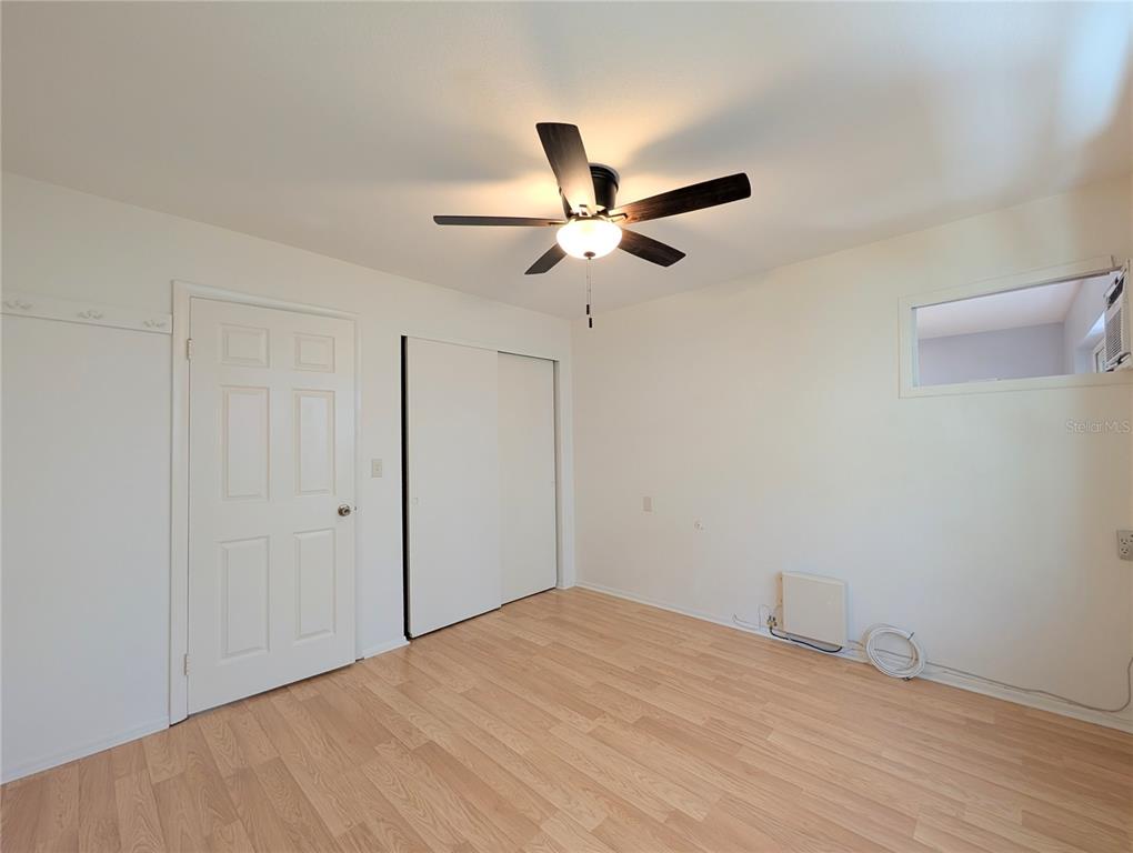 1540 Pleasant Road, Unit G35 Bradenton, FL 34207 - Photo 17 of 23 a view of a room with a ceiling fan