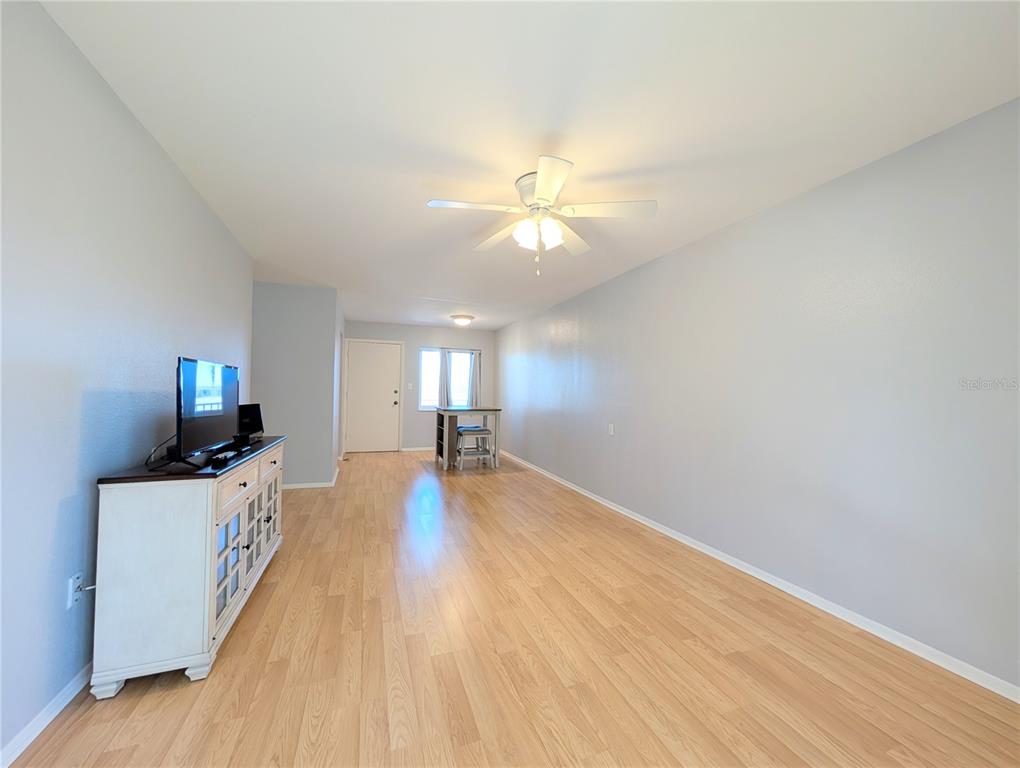 1540 Pleasant Road, Unit G35 Bradenton, FL 34207 - Photo 9 of 23 a view of a house with a sink and wooden floor