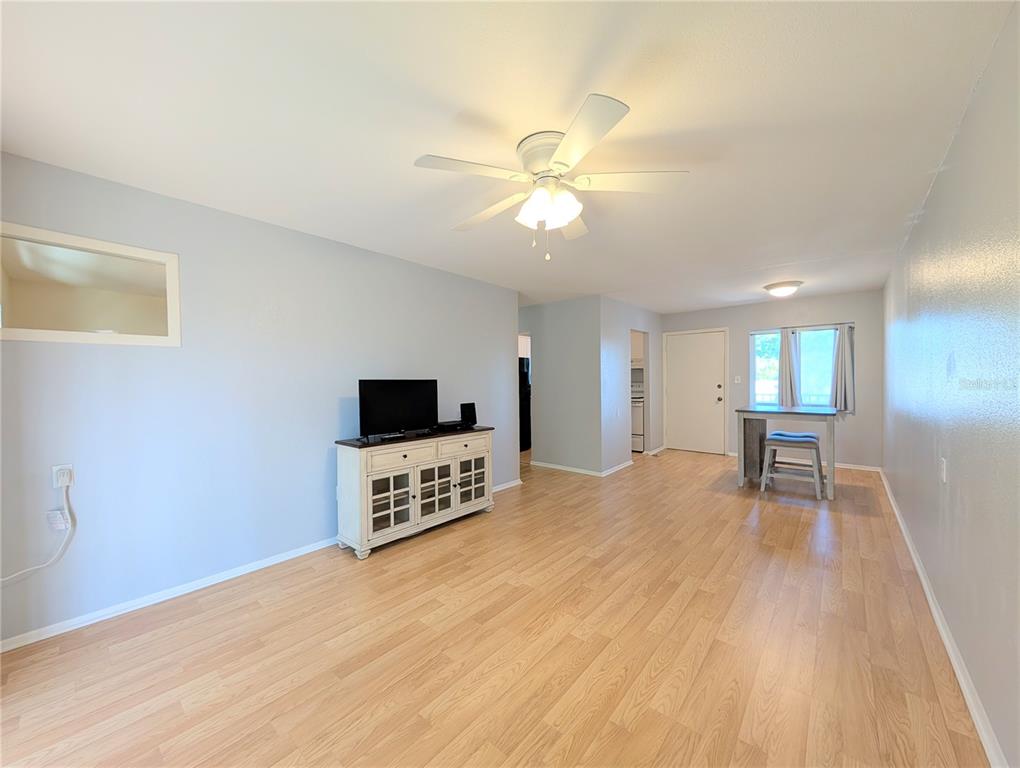 1540 Pleasant Road, Unit G35 Bradenton, FL 34207 - Photo 10 of 23 a view of a livingroom with a flat screen tv