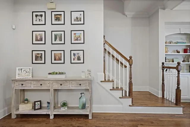 a utility room with multiple dryer and washer