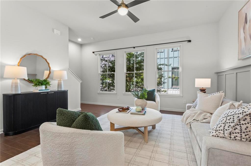 718 Needletail Way Atlanta, GA 30312 - Photo 12 of 44 a living room with furniture and a large window