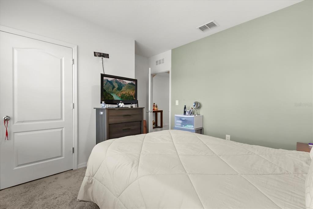 201 Wood Hollow Road DeLand, FL 32724 - Photo 15 of 32 a large white bed in a white room