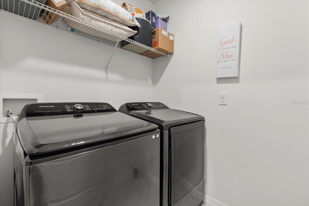 201 Wood Hollow Road DeLand, FL 32724 - Photo 21 of 32 a close view of washer and dryer