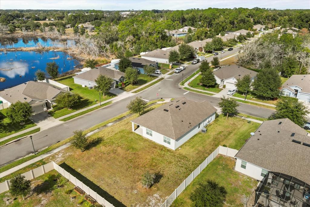 201 Wood Hollow Road DeLand, FL 32724 - Photo 5 of 32 an aerial view of residential houses with outdoor space