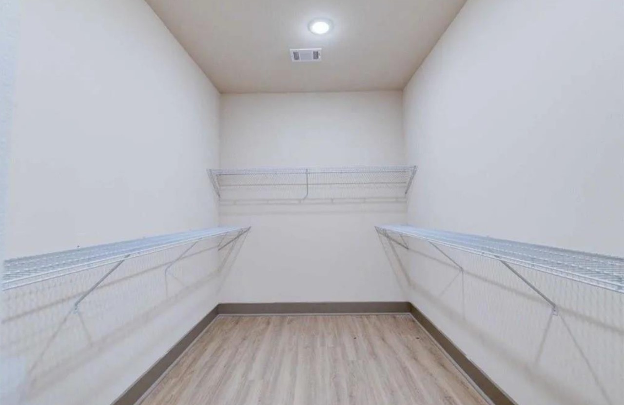 18620 Louetta Creek Drive, Unit 11B Spring, TX 77388 - Photo 11 of 15 a view of an empty walk in closet