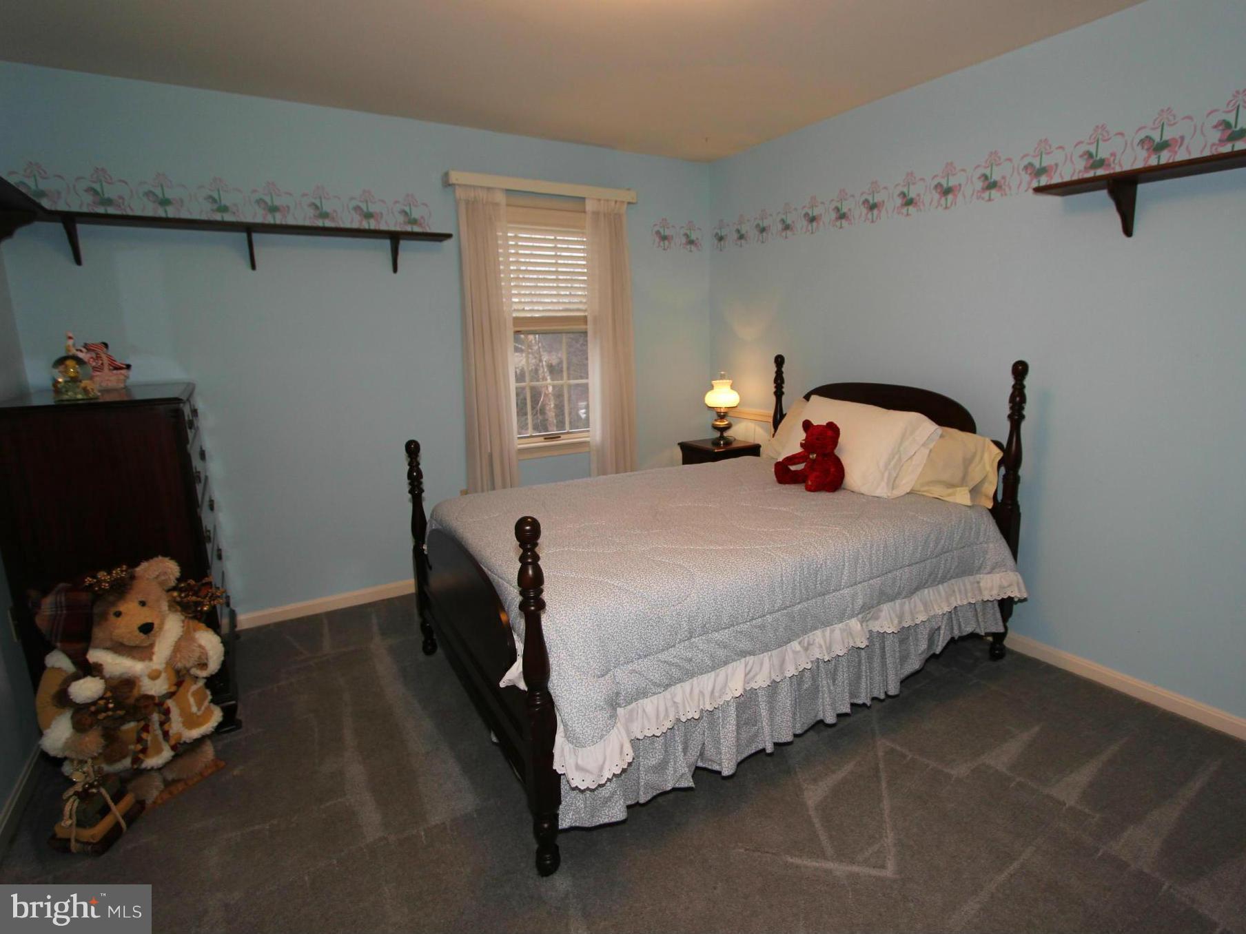 6700 Stone Ridge Court Frederick, MD 21702 - Photo 14 of 30 a bedroom with a bed and a window
