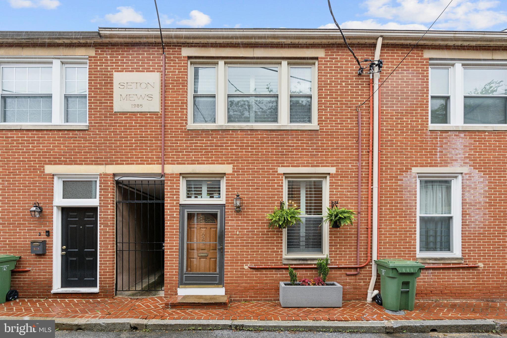 a front view of a building with windows