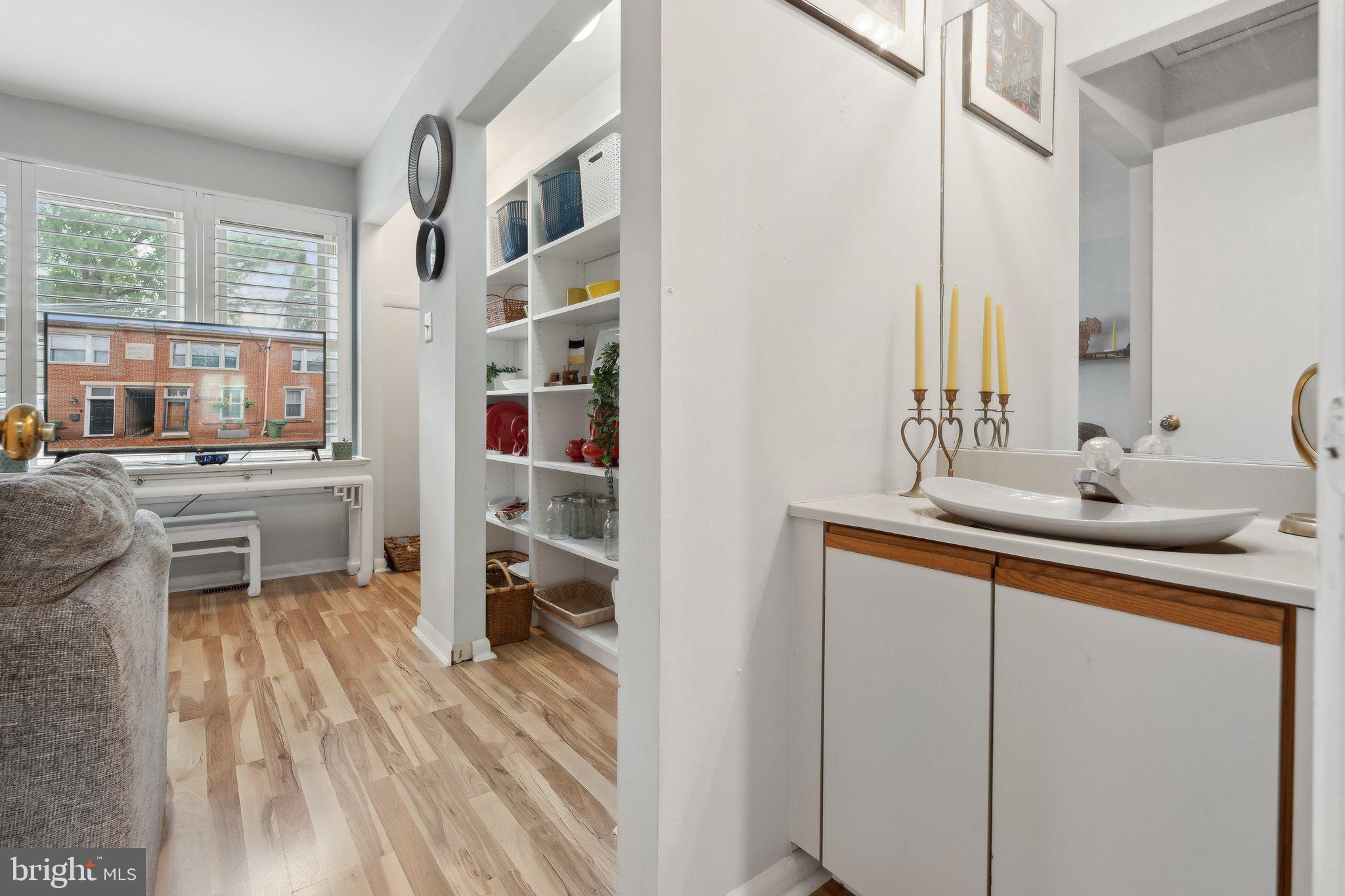 623 Jasper Street Baltimore, MD 21201 - Photo 21 of 32 a kitchen with a sink cabinets and counter space
