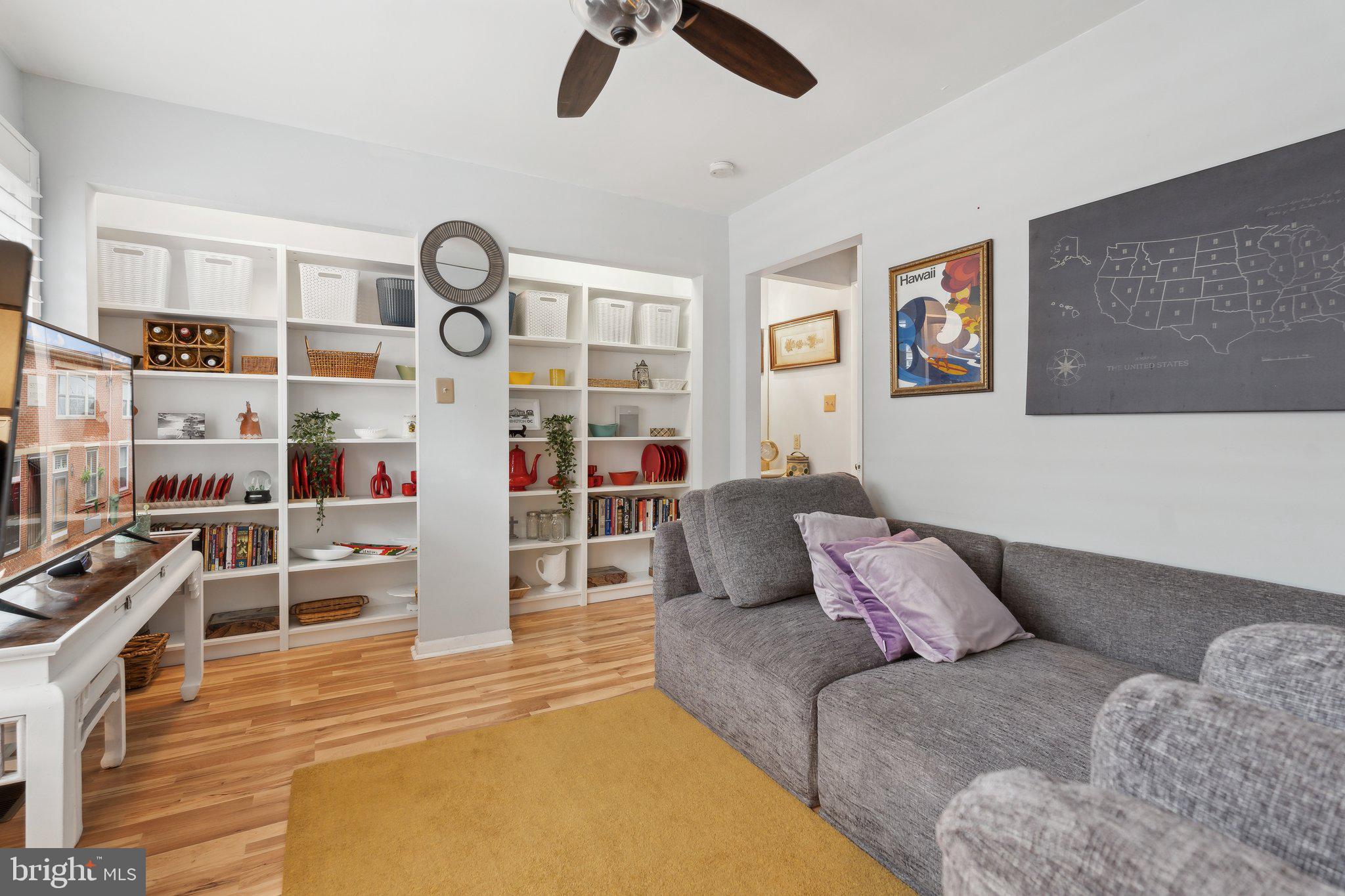 623 Jasper Street Baltimore, MD 21201 - Photo 24 of 32 a living room with furniture cabinets and window