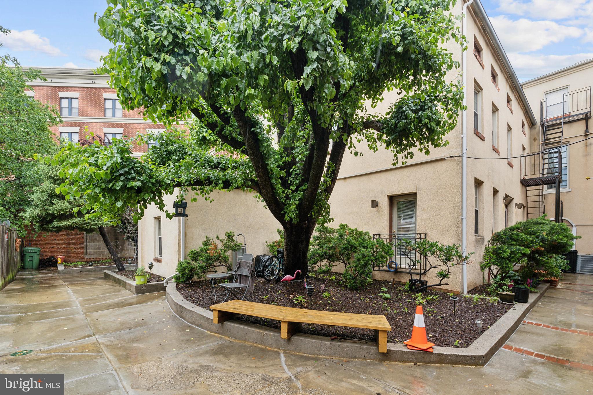 623 Jasper Street Baltimore, MD 21201 - Photo 26 of 32 a view of a chair and table in the backyard