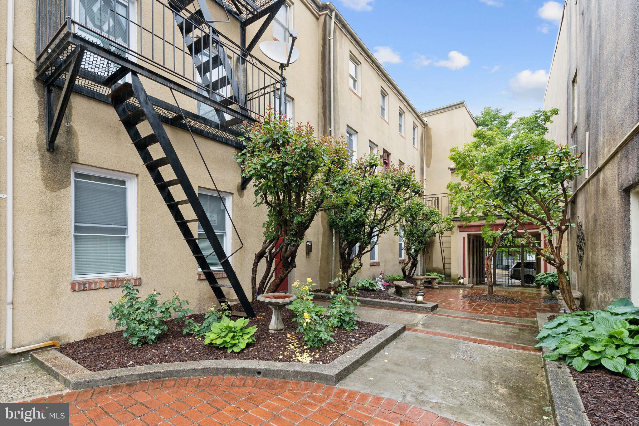 623 Jasper Street Baltimore, MD 21201 - Photo 27 of 32 a front view of a house with a tree