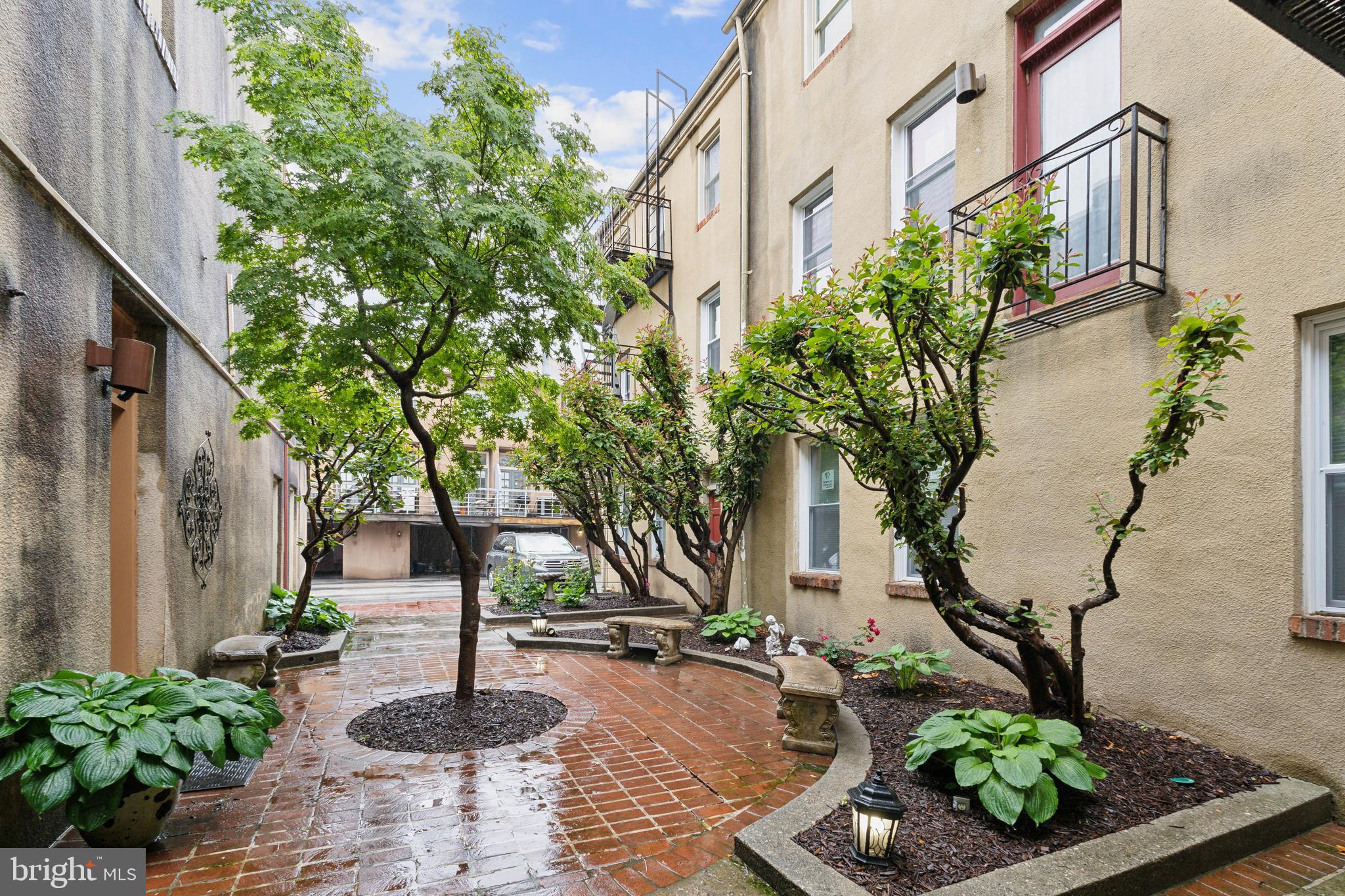 623 Jasper Street Baltimore, MD 21201 - Photo 28 of 32 a front view of a house with garden