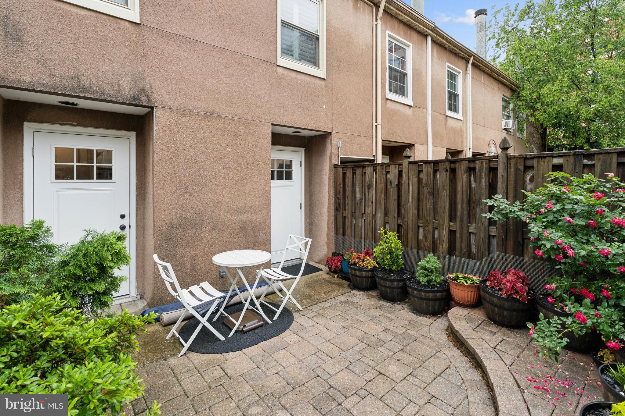 623 Jasper Street Baltimore, MD 21201 - Photo 30 of 32 a view of a chairs and table in the backyard