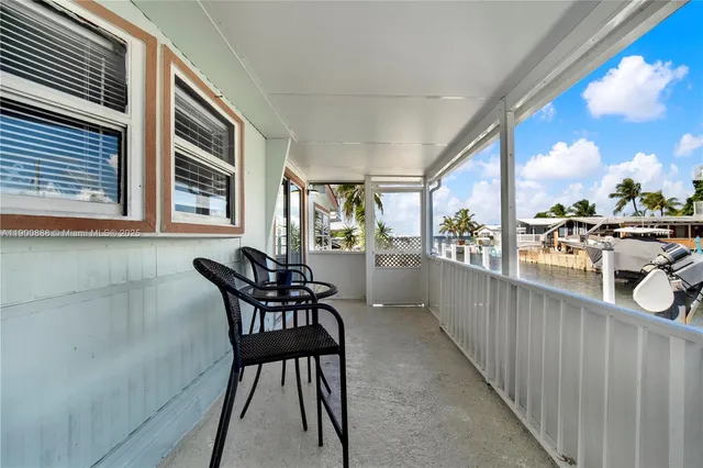 a kitchen with lots of counter top space and furniture