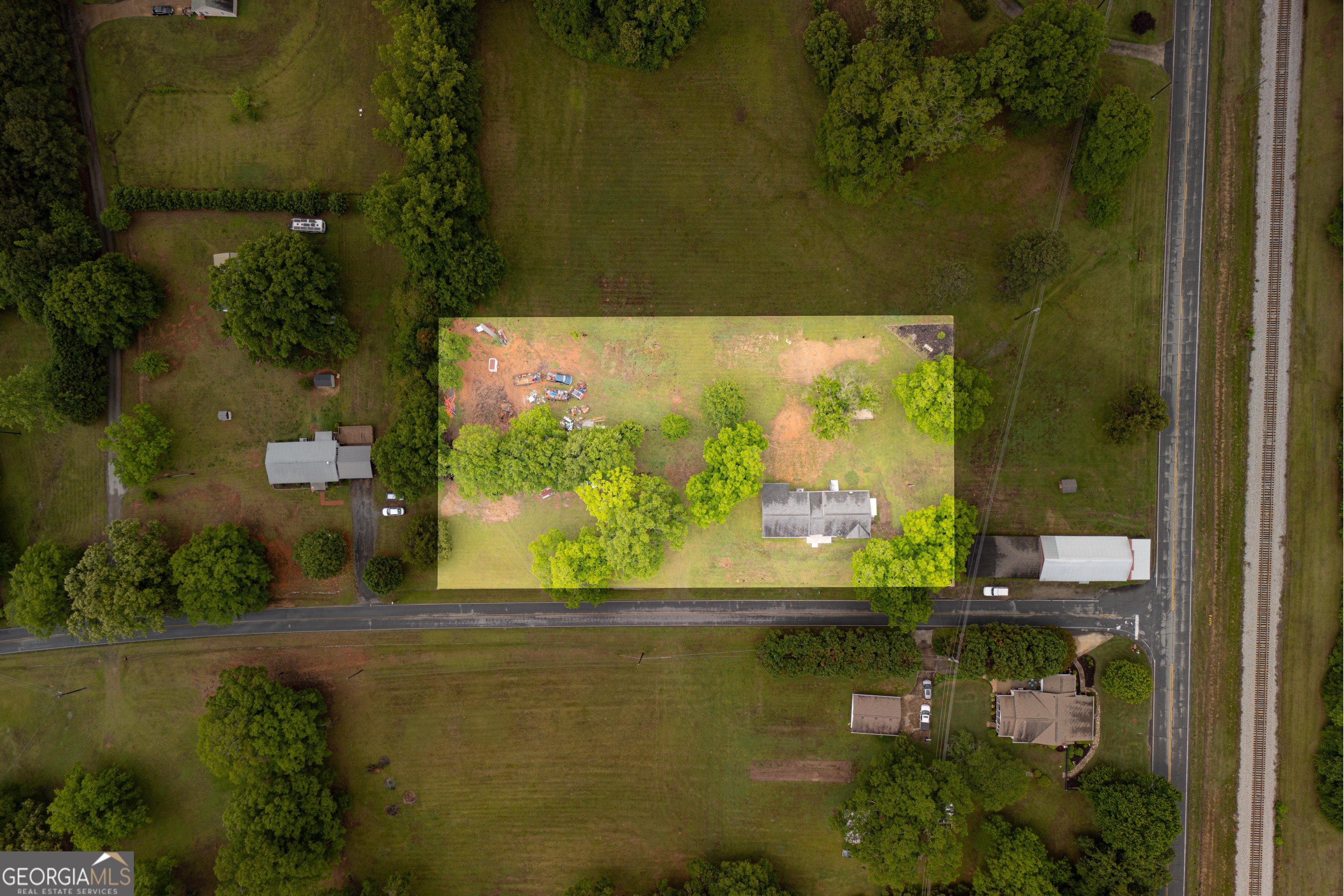 418 Lamb Road Moreland, GA 30259 - Photo 27 of 32 an aerial view of a residential houses with outdoor space and swimming pool