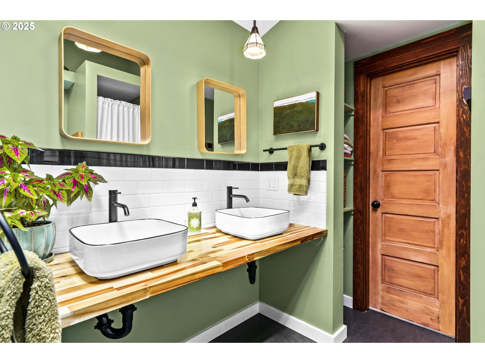 409 North 8th Street Cottage Grove, OR 97424 - Photo 18 of 48 a bathroom with a sink and a mirror