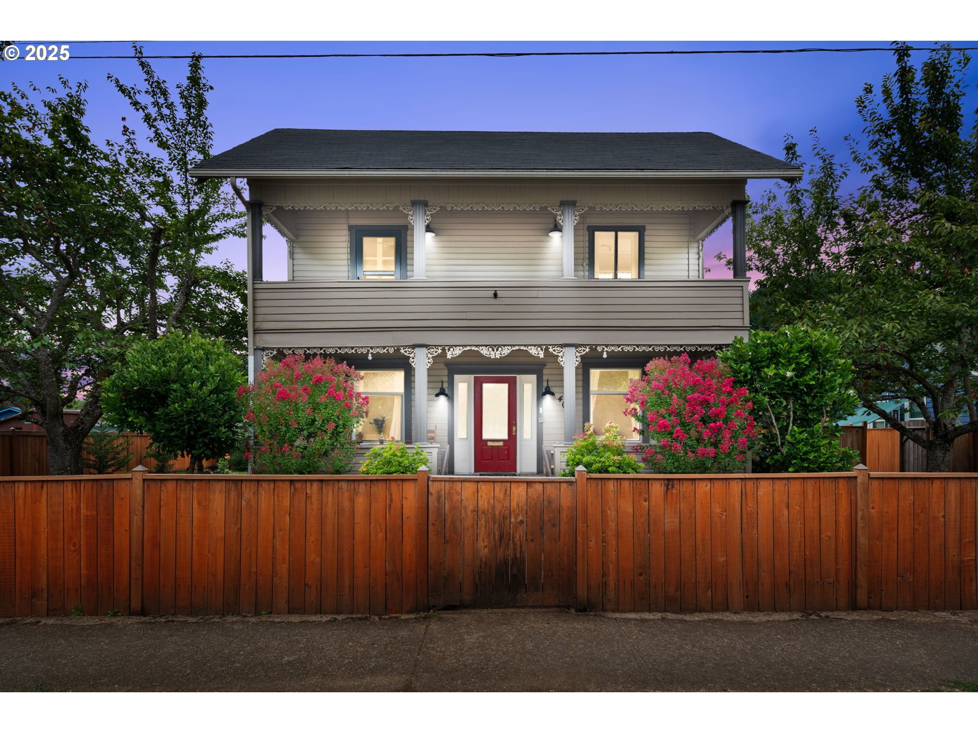 409 North 8th Street Cottage Grove, OR 97424 - Photo 2 of 48 a front view of a house with a yard