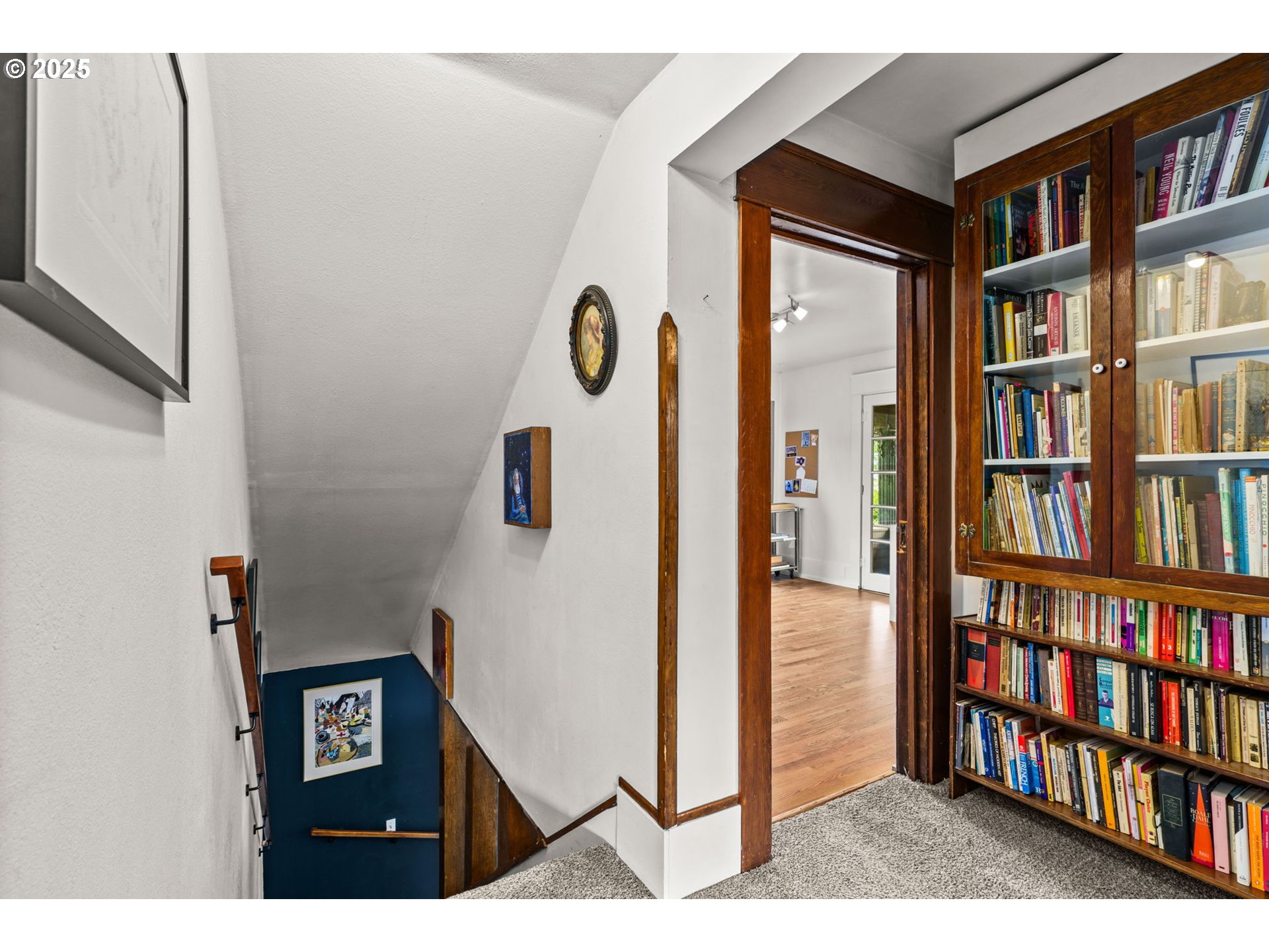 409 North 8th Street Cottage Grove, OR 97424 - Photo 24 of 48 a view of a living room with a book shelf