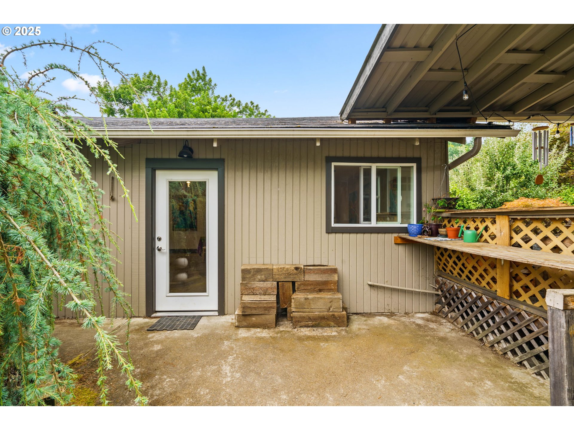 409 North 8th Street Cottage Grove, OR 97424 - Photo 34 of 48 a front view of a house with garden