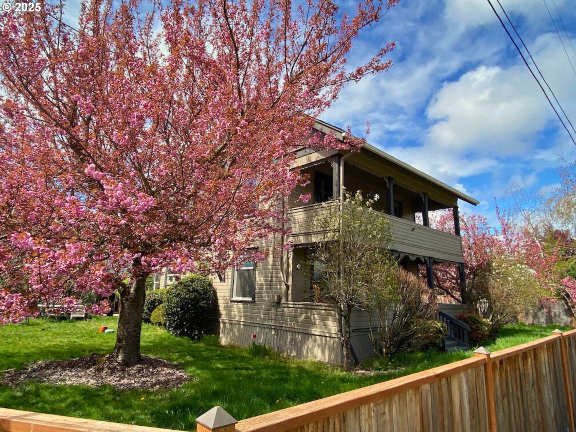 409 North 8th Street Cottage Grove, OR 97424 - Photo 46 of 48 a front view of a house with a yard