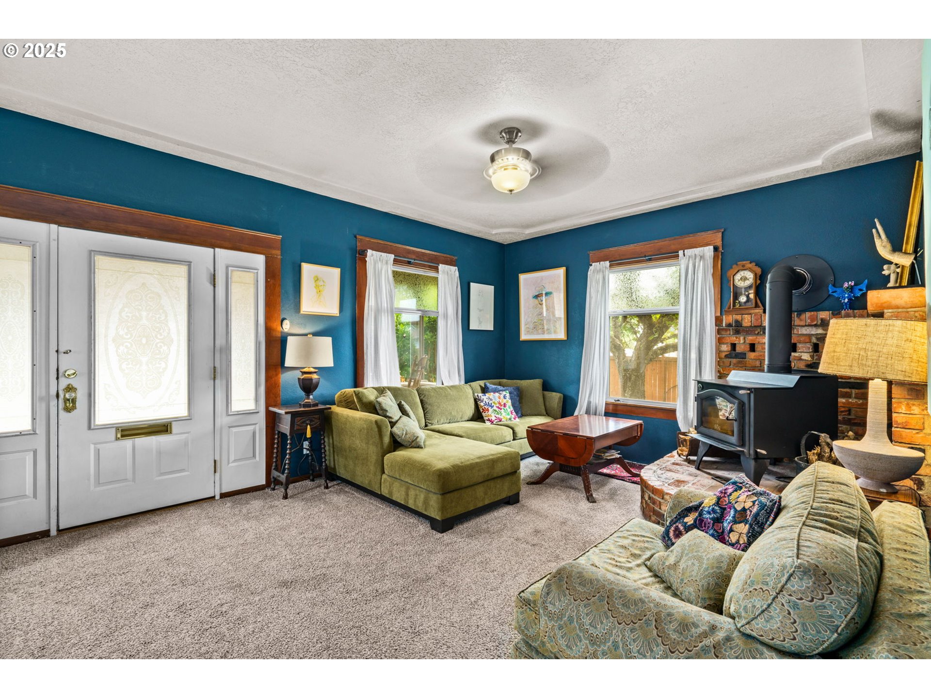 409 North 8th Street Cottage Grove, OR 97424 - Photo 6 of 48 a living room with furniture and a large window