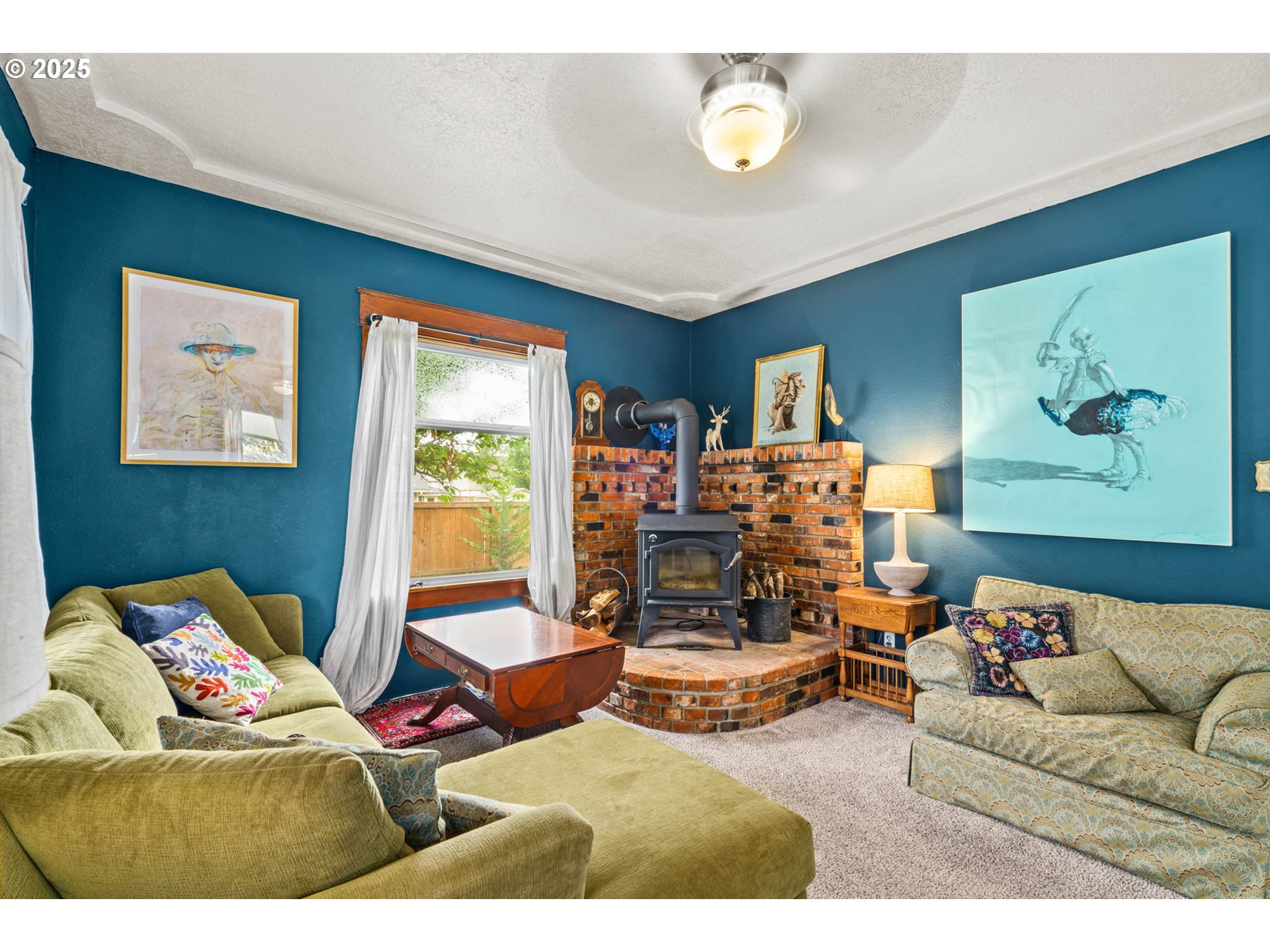 409 North 8th Street Cottage Grove, OR 97424 - Photo 7 of 48 a living room with furniture and a large window