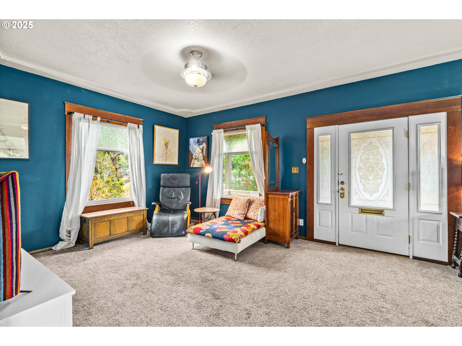 409 North 8th Street Cottage Grove, OR 97424 - Photo 8 of 48 a bedroom with furniture and large windows