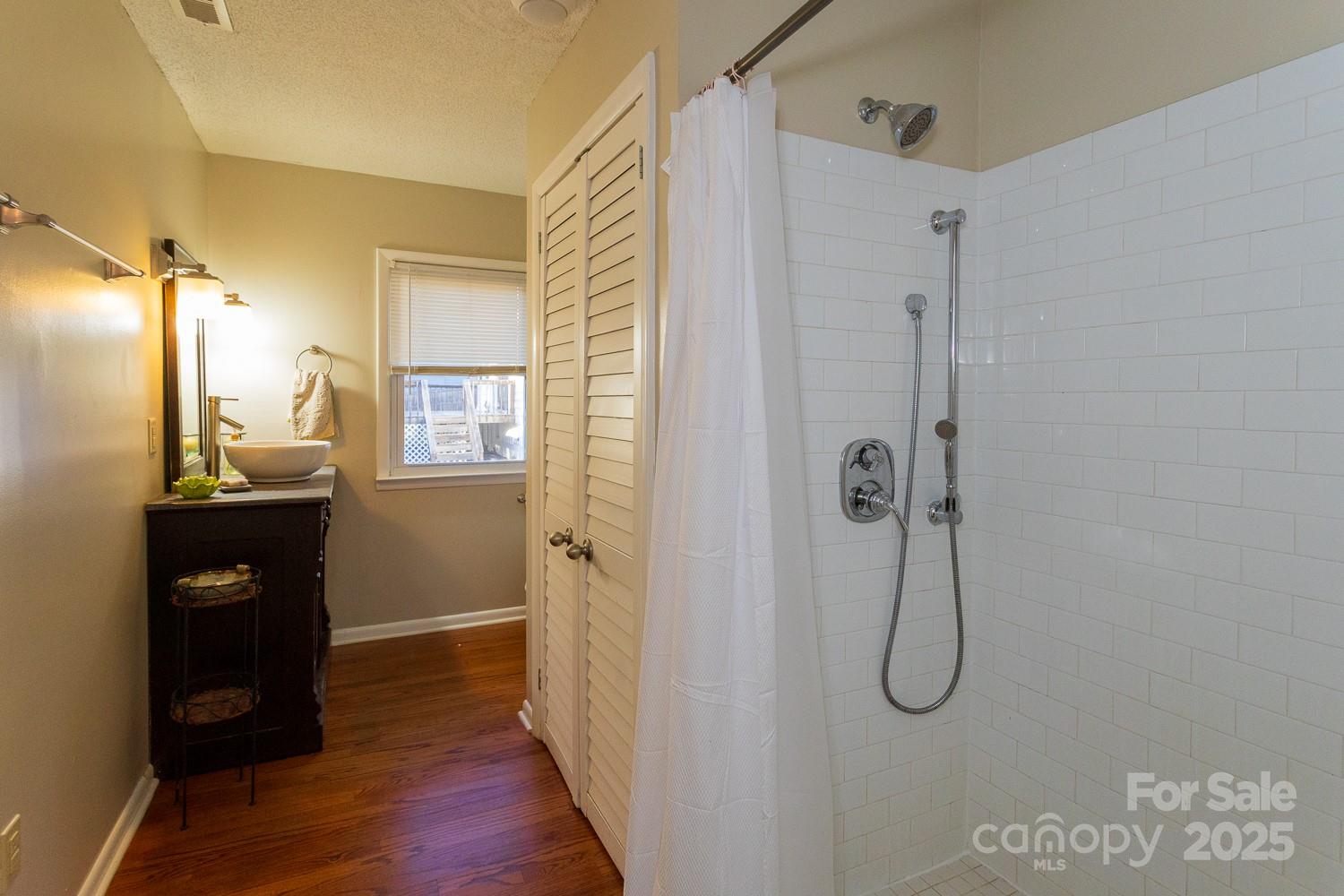 87 Pershing Road Asheville, NC 28805 - Photo 17 of 48 a view of a bathroom from the hallway