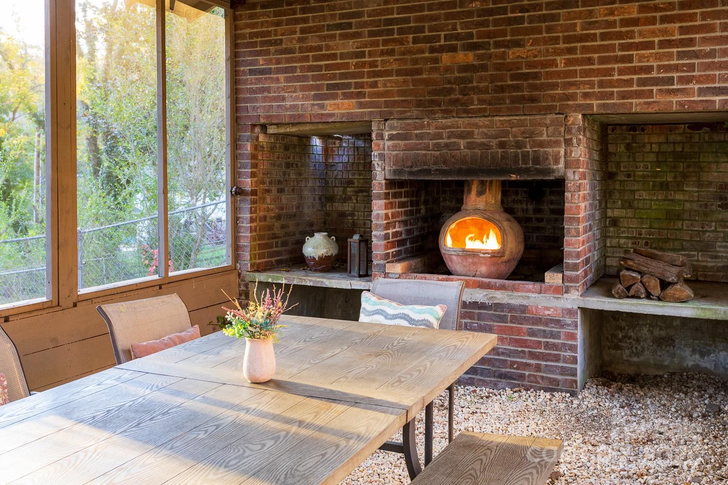 87 Pershing Road Asheville, NC 28805 - Photo 40 of 48 a living room with furniture and a fireplace