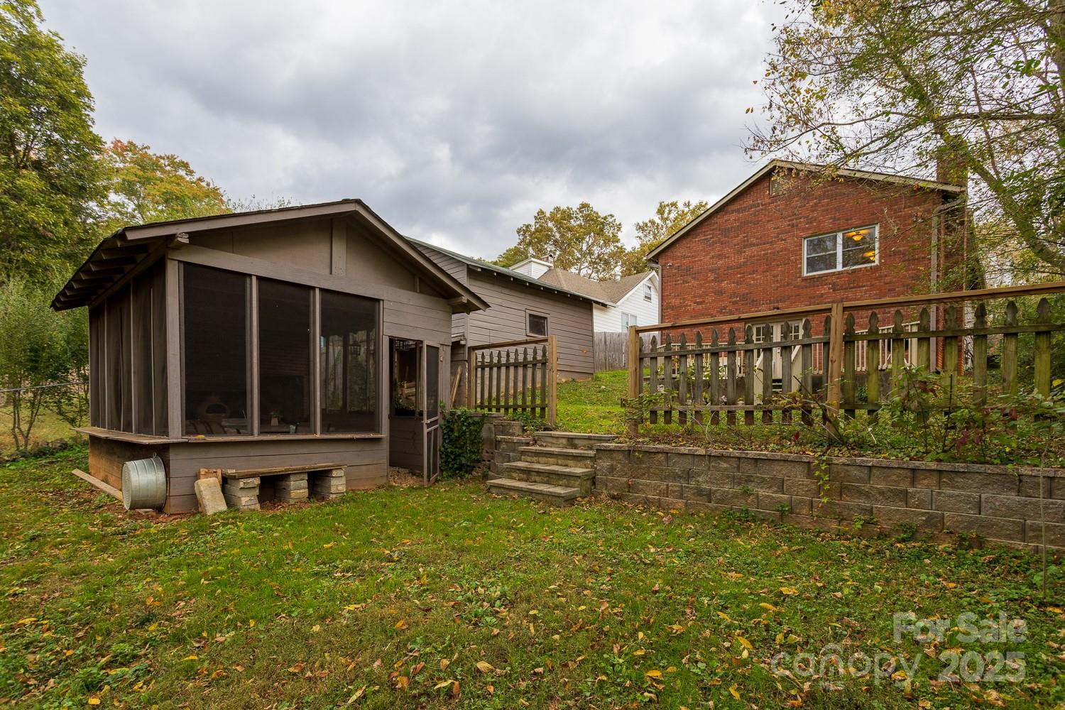 87 Pershing Road Asheville, NC 28805 - Photo 42 of 48 a front view of a house with yard