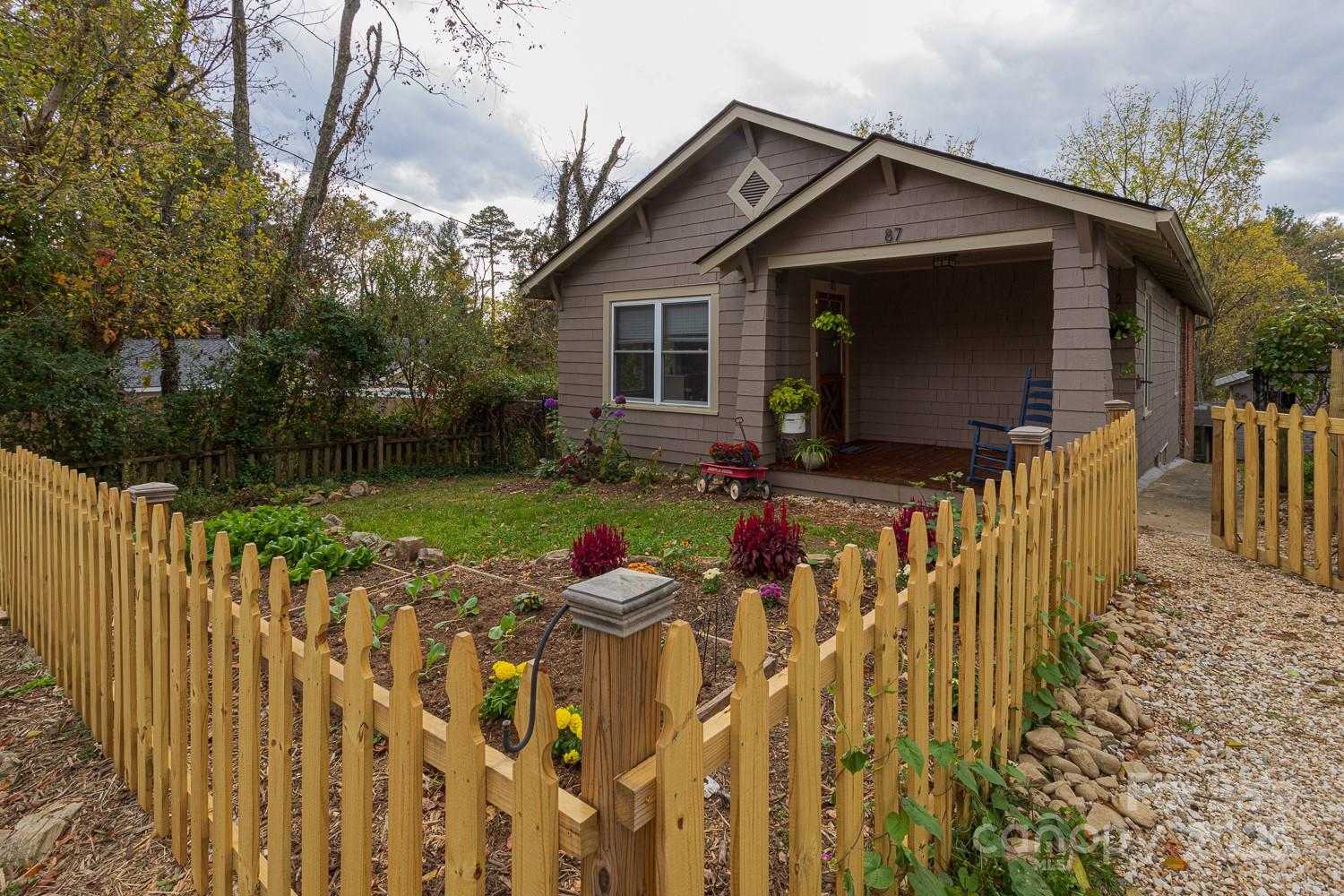 87 Pershing Road Asheville, NC 28805 - Photo 43 of 48 a front view of house with patio