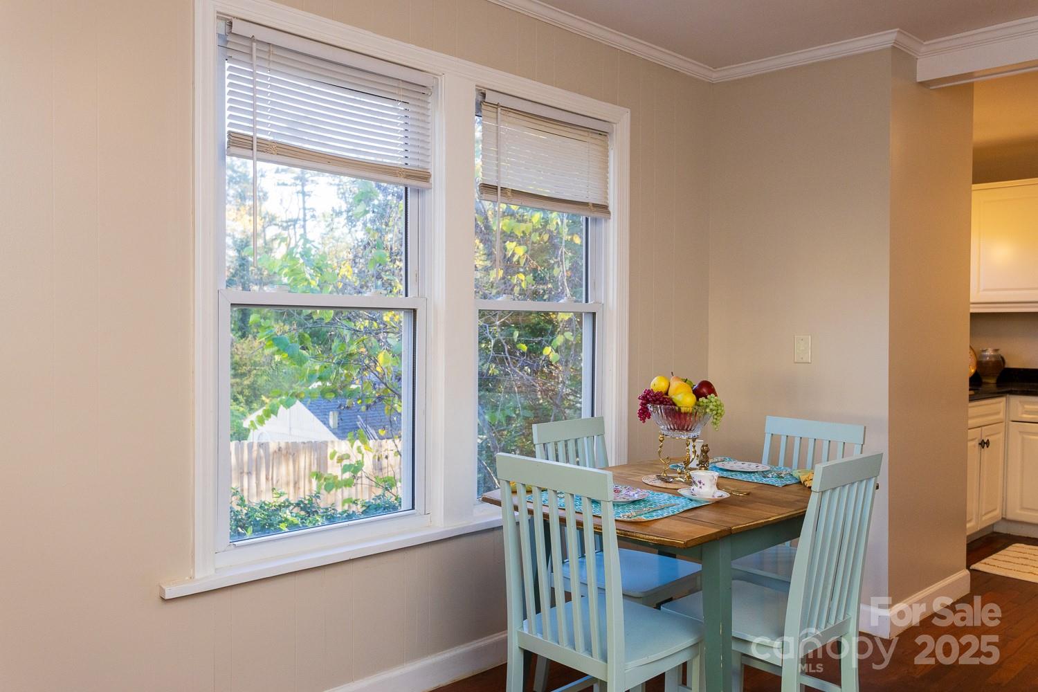87 Pershing Road Asheville, NC 28805 - Photo 10 of 48 a view of a workspace with furniture and a window