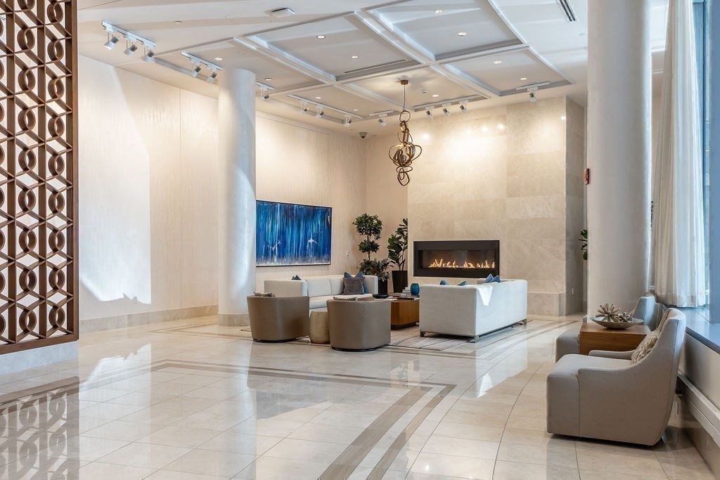 22 Liberty Drive, Unit 2F Boston, MA 02210 - Photo 22 of 28 a living room with furniture and a fireplace