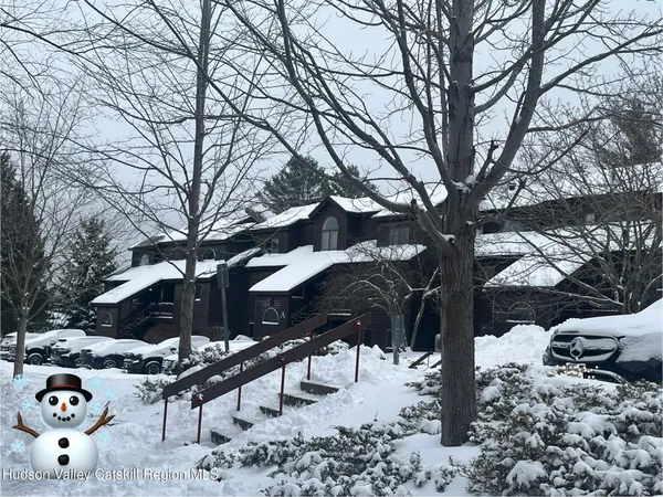 a view of a yard with trees