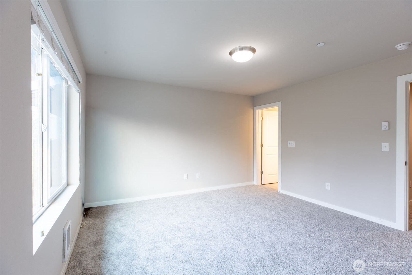 15113 40th Avenue West, Unit B2 Lynnwood, WA 98087 - Photo 11 of 36 a view of empty room with window