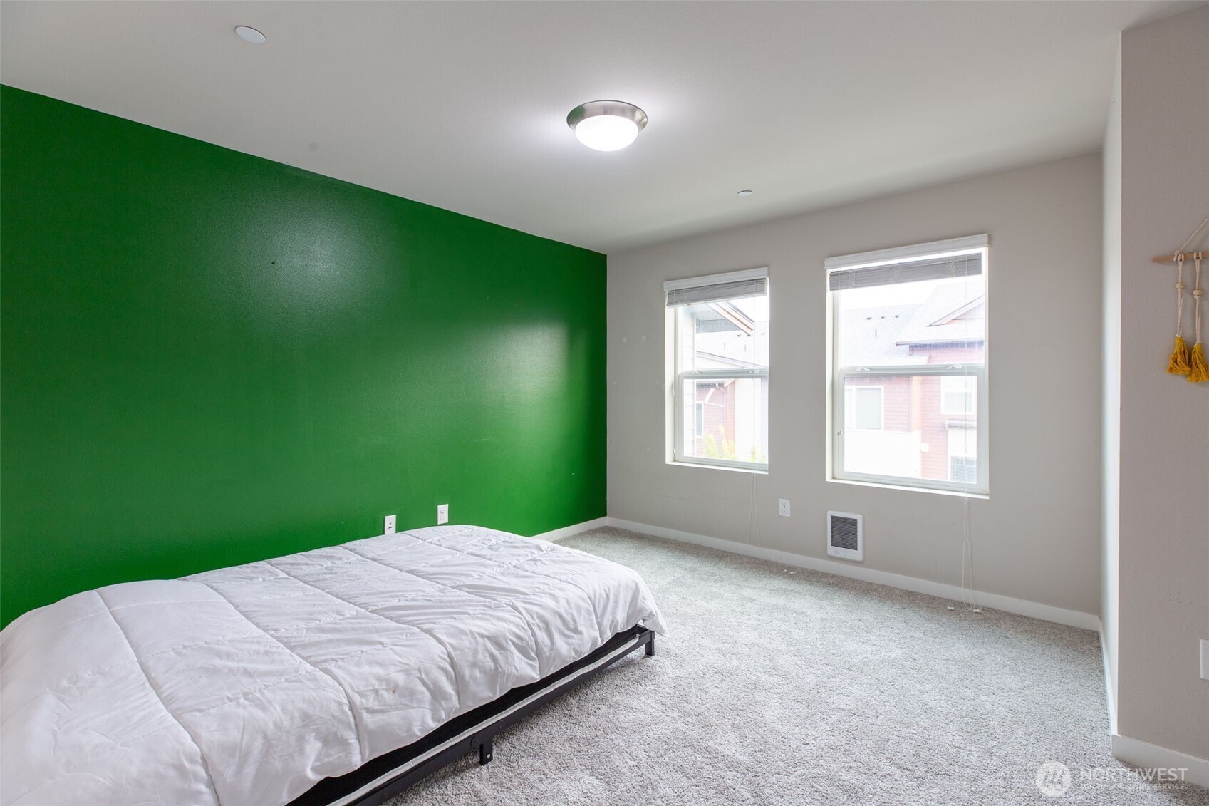 15113 40th Avenue West, Unit B2 Lynnwood, WA 98087 - Photo 16 of 36 a bedroom with a bed and a window