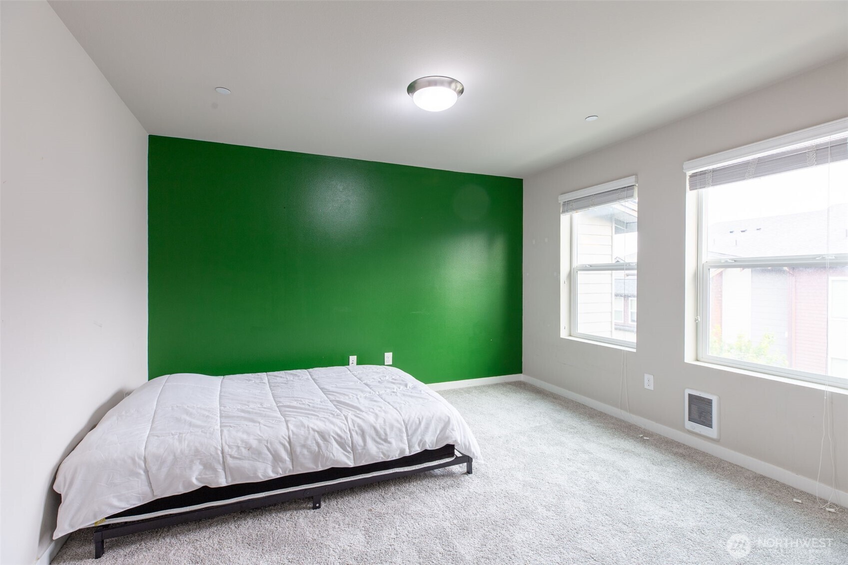 15113 40th Avenue West, Unit B2 Lynnwood, WA 98087 - Photo 17 of 36 a bedroom with a bed and a window