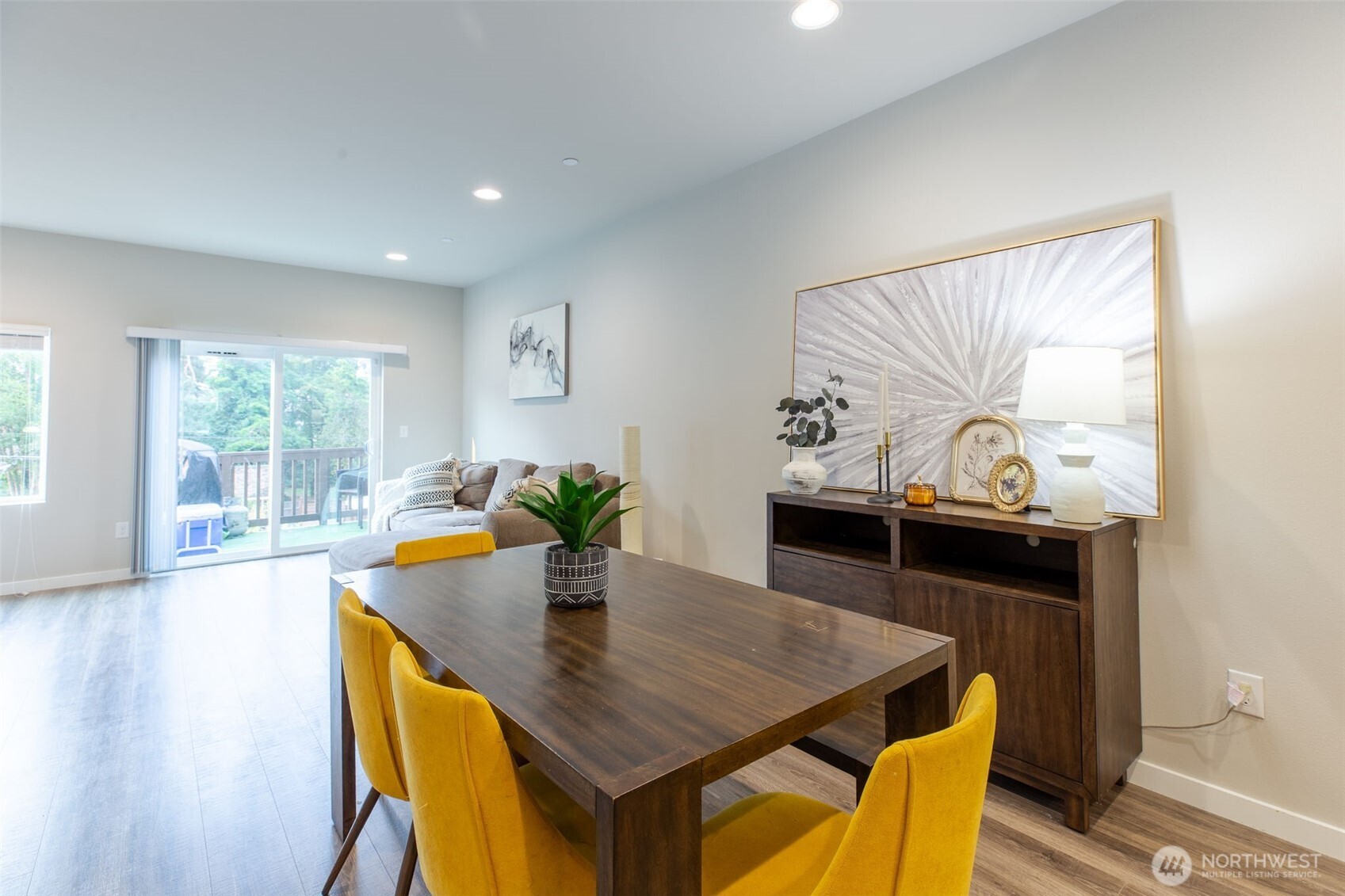 15113 40th Avenue West, Unit B2 Lynnwood, WA 98087 - Photo 26 of 36 a view of a dining room with furniture and wooden floor