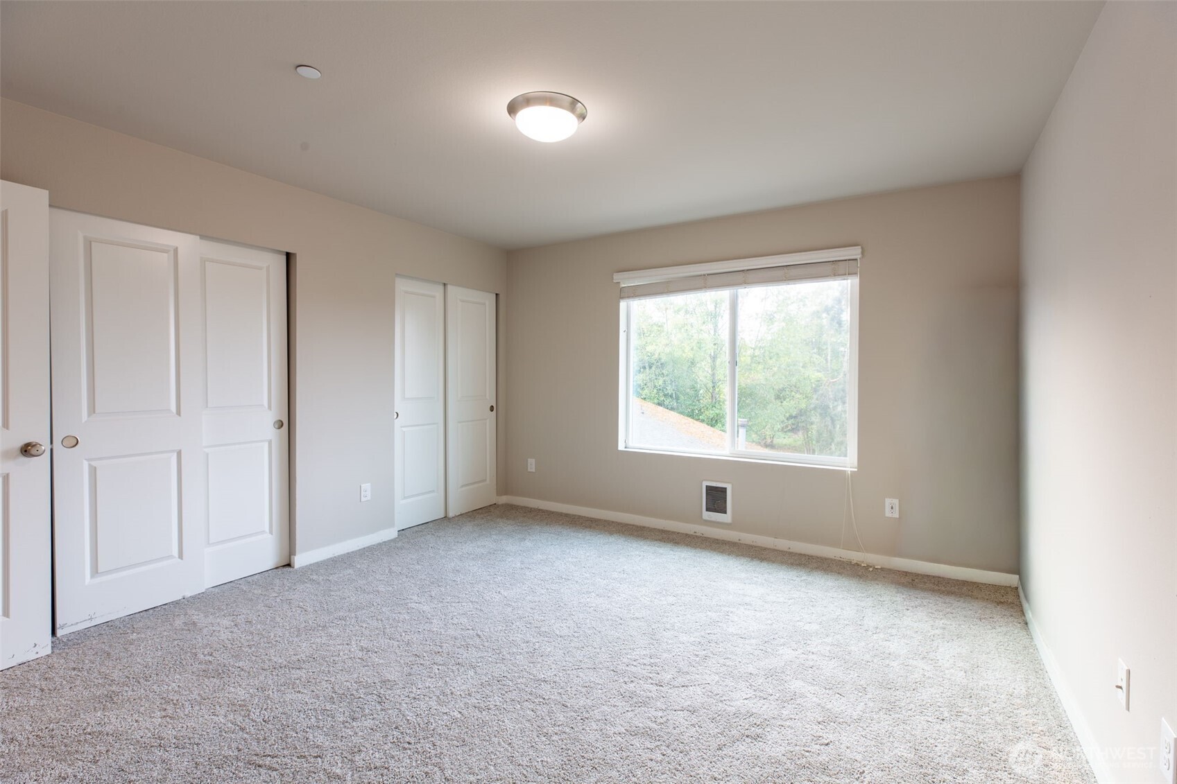 15113 40th Avenue West, Unit B2 Lynnwood, WA 98087 - Photo 8 of 36 a view of empty room with window