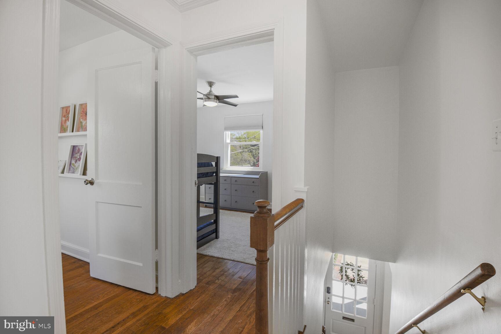 10002 Reddick Drive Silver Spring, MD 20901 - Photo 16 of 33 a view of hallway with wooden floor