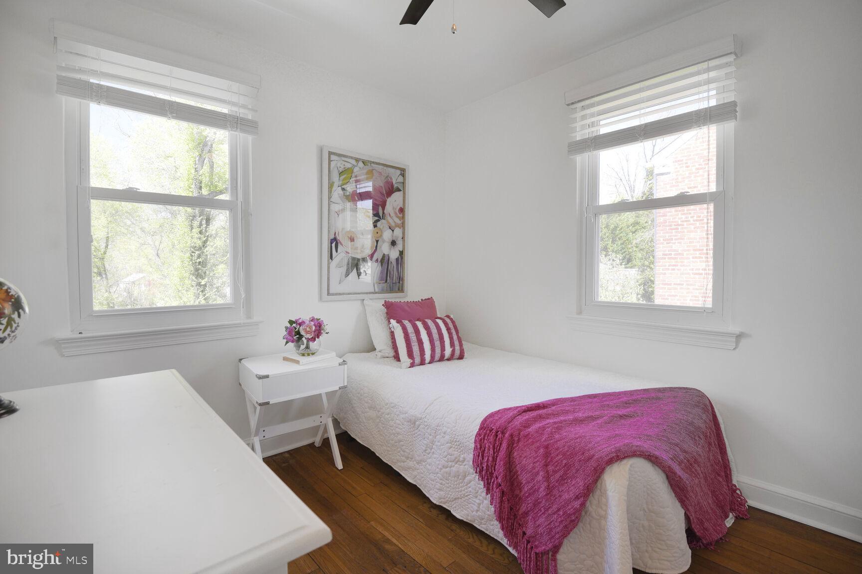 10002 Reddick Drive Silver Spring, MD 20901 - Photo 20 of 33 a bedroom with a bed and a window