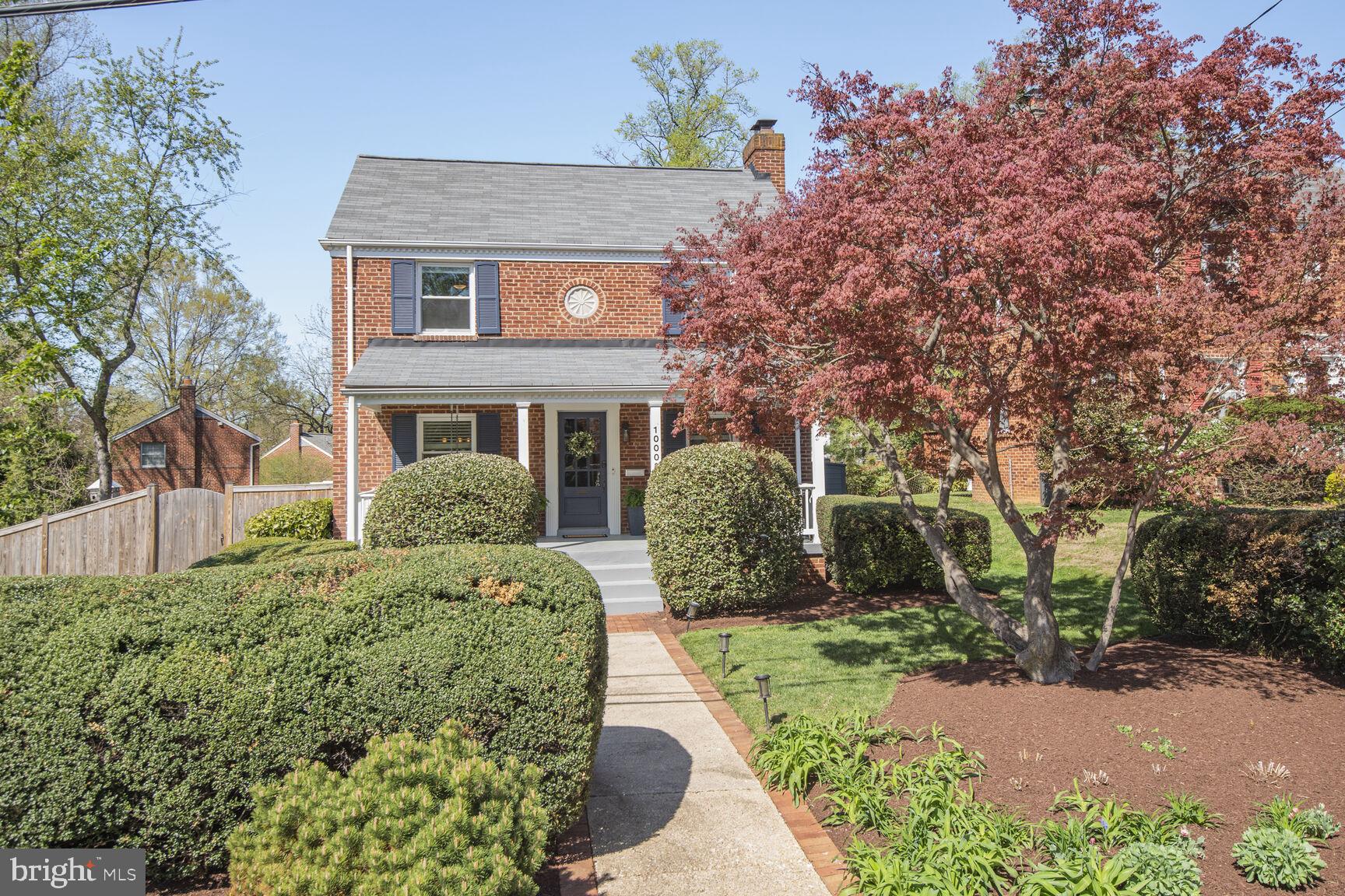 10002 Reddick Drive Silver Spring, MD 20901 - Photo 2 of 33 a front view of a house with a yard