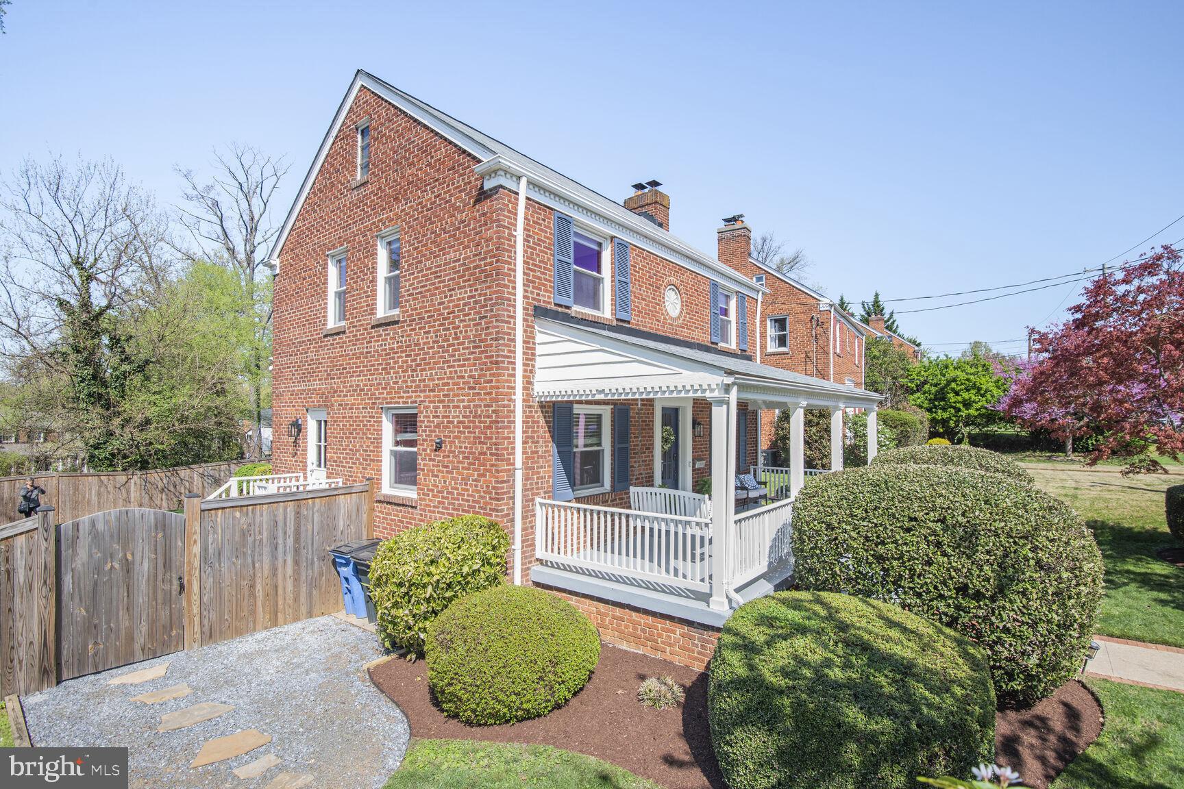 10002 Reddick Drive Silver Spring, MD 20901 - Photo 32 of 33 a front view of a house with a garden