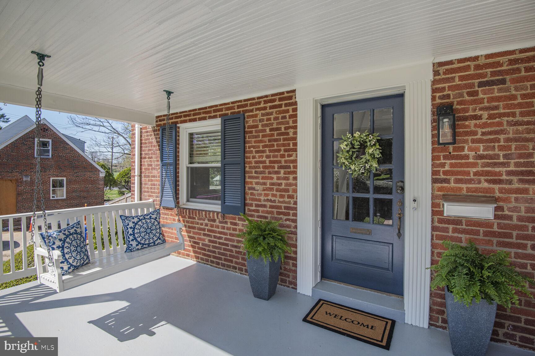10002 Reddick Drive Silver Spring, MD 20901 - Photo 4 of 33 a view of front door with outdoor seating